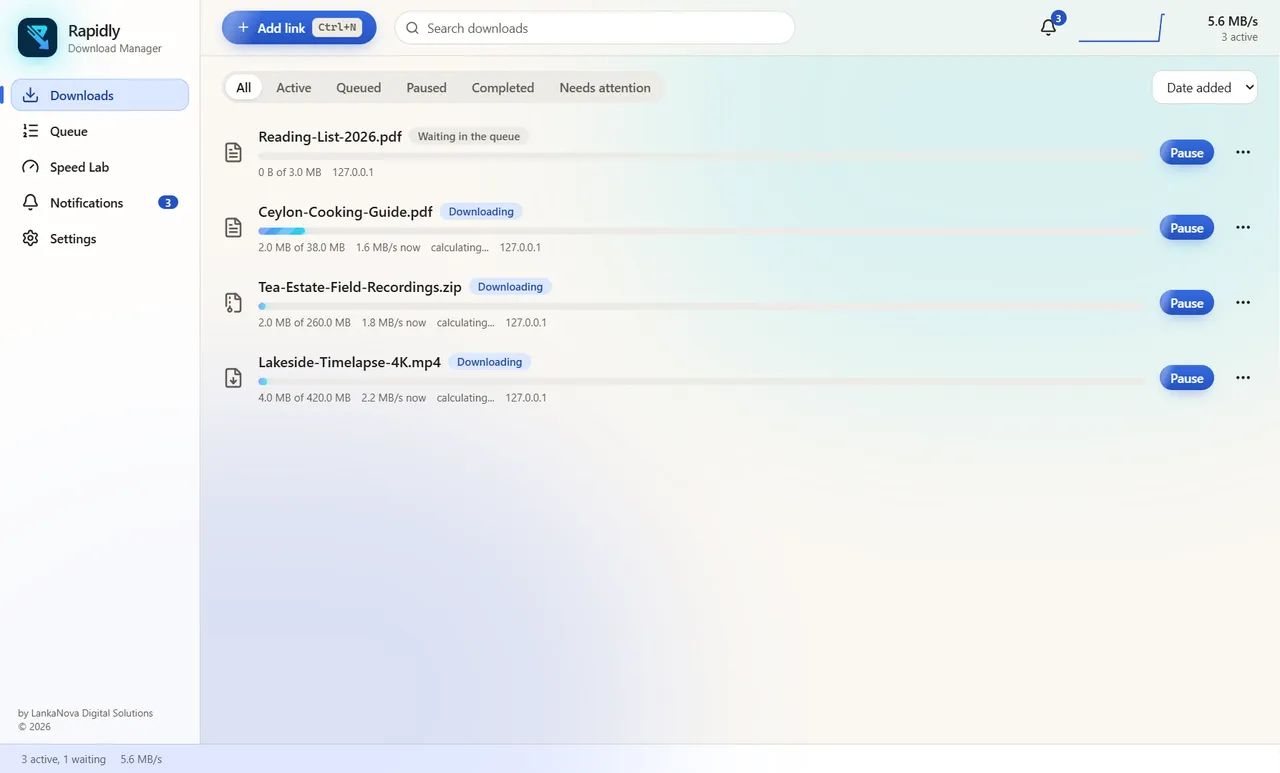 The Rapidly downloads list in light mode: several downloads in progress with measured speeds.